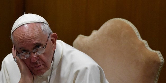 Pope Francis attends the second morning session of the Synod on the Family at the Vatican on October 6, 2015. AFP PHOTO /
