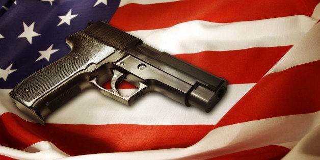 Handgun lying on American flag