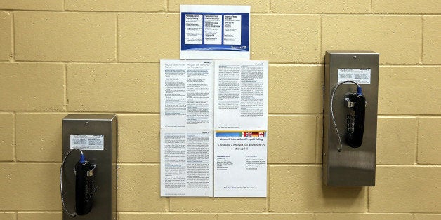 FREMONT, CA - AUGUST 01: Pay phones for inmates are seen on a wall at the Fremont Police Detention Facility on August 1, 201