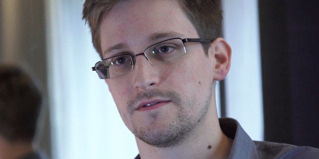 HONG KONG - 2013: (EDITOR'S NOTE: ONLY AVAILABLE TO NEWS ORGANISATIONS AND NOT FOR ENTERTAINMENT USE) In this handout photo provided by The Guardian, Edward Snowden speaks during an interview in Hong Kong. Snowden, a 29-year-old former technical assistant for the CIA, revealed details of top-secret surveillance conducted by the United States' National Security Agency regarding telecom data. (Photo by The Guardian via Getty Images)