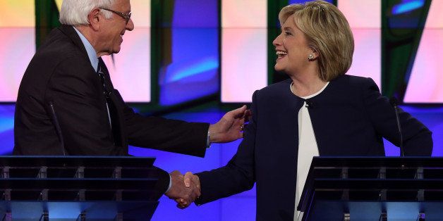 LAS VEGAS, NV - OCTOBER 13: Democratic presidential candidates U.S. Sen. Bernie Sanders (I-VT) (L) and Hillary Clinton shake hands at the end of a presidential debate sponsored by CNN and Facebook at Wynn Las Vegas on October 13, 2015 in Las Vegas, Nevada. Five Democratic presidential candidates are participating in the party's first presidential debate. (Photo by Joe Raedle/Getty Images)