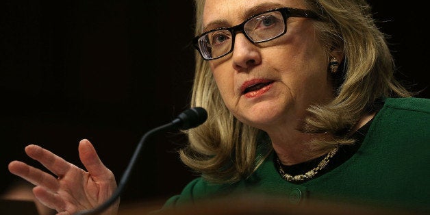 WASHINGTON, DC - JANUARY 23: U.S. Secretary of State Hillary Clinton testifies before the Senate Foreign Relations Committee about the September 11 attacks against the U.S. mission in Benghazi, Libya, on Capitol Hill January 23, 2013 in Washington, DC. Lawmakers questioned Clinton about the security failures that led to the death of four Americans, including U.S. Ambassador Christopher Stevens. (Photo by Alex Wong/Getty Images)