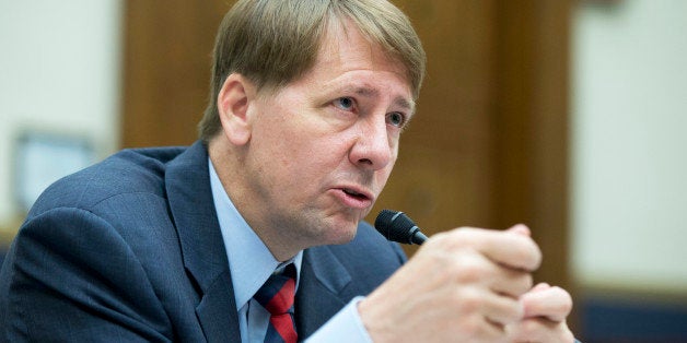 FILE - In this Sept. 12, 2013 file photo, Consumer Financial Protection Bureau (CFPB) Director Richard Cordray testifies on Capitol Hill in Washington. The CFPB on Thursday, June 25, 2015 is releasing the first batch of its highly awaited database of consumer complaints filed against local banks, credit card and mortgage companies. The 7,700 public narratives, collected starting in March 2015, are only a fraction of the 627,000 complaints the bureau has fielded since its inauguration in 2011. (AP Photo/Manuel Balce Ceneta, File)