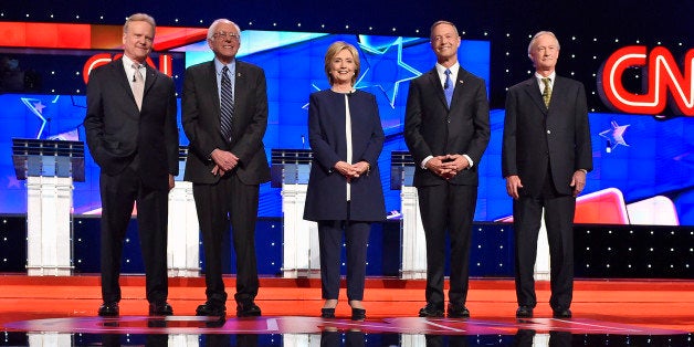 In this Oct. 13, 2015, photo, Democratic presidential candidates from left, former Virginia Sen. Jim Webb, Sen. Bernie Sanders, I-Vt., Hillary Rodham Clinton, former Maryland Gov. Martin O'Malley, and former Rhode Island Gov. Lincoln Chafee take the stage before the CNN Democratic presidential debate in Las Vegas. Democratic presidential candidates gave a meaningful public nod to the Black Lives Matter movement in their first televised debate. The candidates invoked its slogan and raised the core concerns stemming from police killings of African-Americans. Protesters have articulated those concerns in disrupting some of the candidatesâ campaign events. (AP Photo/David Becker)