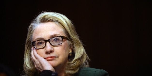 US Secretary of State Hillary Clinton testifies before the Senate Foreign Relations Committee on the September 11, 2012 attack on the US mission in Benghazi, Libya, during a hearing on Capitol Hill in Washington, DC, on January 23, 2013. Secy. Clinton warned of the challenges posed by rising militancy after the Arab Spring as she appeared before US lawmakers Wednesday to be grilled about a deadly attack. 'Benghazi didn't happen in a vacuum,' Clinton said at the start of a Senate hearing into the September 11 assault on a US mission in eastern Libya. AFP PHOTO / Saul LOEB (Photo credit should read SAUL LOEB/AFP/Getty Images)