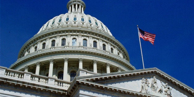 WASHINGTON, UNITED STATES - JANUARY 01: The stars and stripes flag flying at the Capitol Building, Washington, USA.