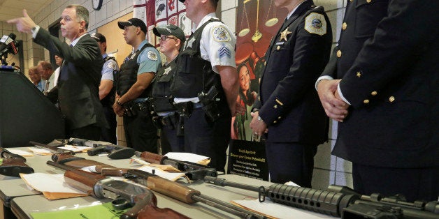 FILE - In this Monday, July 7, 2014, file photo, Chicago Police Superintendent Garry McCarthy speaks at a news conference as police displayed Chicago police display some of the thousands of illegal firearms they have confiscated so far this year in their battle against gun violence. The recent mass shooting at an Oregon community college has put the debate over gun violence and gun control into the center of the presidential race. At least some of the Republicans who are running have pointed to Chicago as proof that gun control laws don't work. (AP Photo/M. Spencer Green, File)