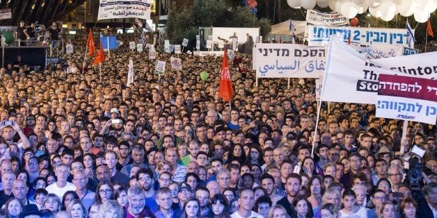 A general view shows people attending a commemorative rally in memory of late Israeli prime minister Yitzhak Rabin, at Rabin Square in the Israeli coastal city of Tel Aviv on October 31, 2015. The rally is part of commemorations marking the 20th anniversary of Rabin's killing by a right-wing Jewish extremist. AFP PHOTO / JACK GUEZ (Photo credit should read JACK GUEZ/AFP/Getty Images)