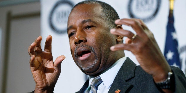 Republican presidential candidate Ben Carson gestures during a news conference during a campaign stop, Thursday, Oct. 29, 201