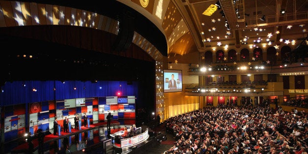 MILWAUKEE, WI - NOVEMBER 10: Presidential candidates Rick Santorum (L-R), New Jersey Governor Chris Christie, Mike Huckabee, and Louisiana Governor Bobby Jindal take part in the Republican Presidential Debate sponsored by Fox Business and the Wall Street Journal at the Milwaukee Theatre November 10, 2015 in Milwaukee, Wisconsin. The fourth Republican debate is held in two parts, one main debate for the top eight candidates, and another for four other candidates lower in the current polls. (Photo by Scott Olson/Getty Images)