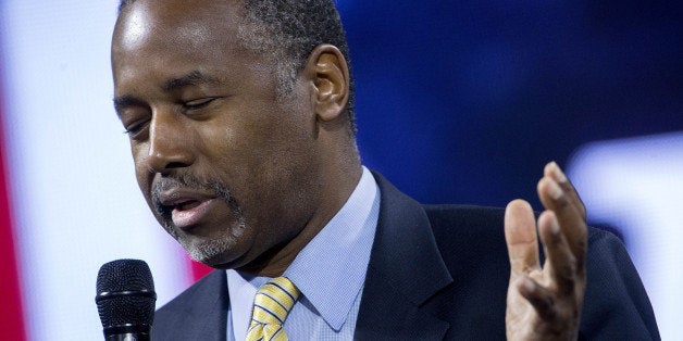 Ben Carson, 2016 Republican presidential candidate, speaks during a Liberty University Convocation in Lynchburg, Virginia, U.S., on Wednesday, Nov. 11, 2015. As retired neurosurgeon Carson has risen in the polls, media reports have revisited his accounts of acts of violence as a child, a key part of the redemption story he discusses on the campaign trail. Photographer: Andrew Harrer/Bloomberg via Getty Images 