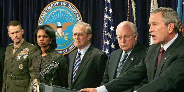 Washington, UNITED STATES: US President George W. Bush(R) offers condolences to the families of 12 coal miners who died after having been trapped by an underground explosion in the Sago Mine during a press conference 04 January, 2006 at the Pentagon in Washington, DC. Bush was at the Pentagon attending a briefing on Iraq from US military leaders involved with the 'war on terror'. In the photo L-R are: Chairman of the Joint Chiefs of Staff Gen. Peter Pace, US Secretary of State Condoleezza Rice, Secretary of Defense Donald Rumsfeld, Vice-President Dick Cheney and President Bush. AFP Photo/Paul J. RICHARDS (Photo credit should read PAUL J. RICHARDS/AFP/Getty Images)