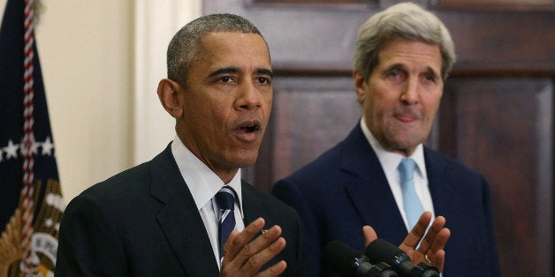 WASHINGTON, DC - NOVEMBER 06: U.S. President Barack Obama, flanked by U.S. Secretary of State John Kerry (R), announces his d