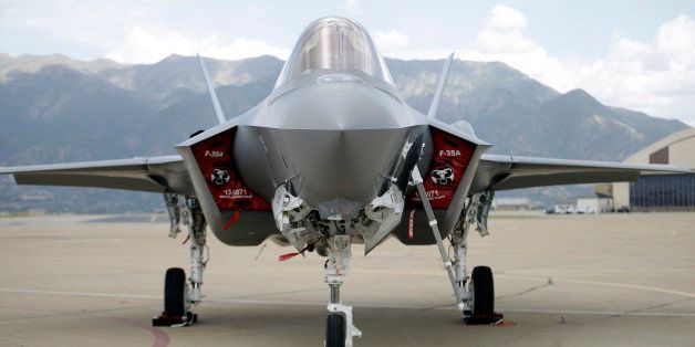 An F-35 jet sits on the tarmac at its new operational base Wednesday, Sept. 2, 2015, at Hill Air Force Base, in northern Utah. Two F-35 jets touched down Wednesday afternoon at the base, about 20 miles north of Salt Lake City. A total of 72 of the fighter jets and their pilots will be permanently based in Utah. (AP Photo/Rick Bowmer)