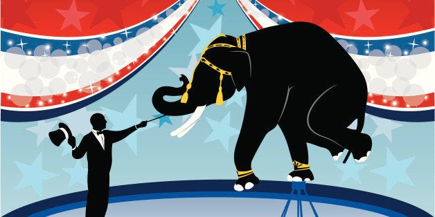 A ring master giving a show with an elephant at a circus.