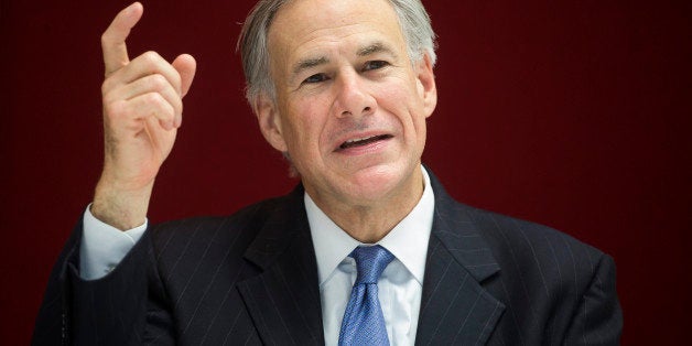 Greg Abbott, governor of Texas, speaks during an interview in New York, U.S., on Tuesday, July 14, 2015. Since Texas won a court case allowing it to refuse Confederate flag license plates, the state has been in the vanguard on the debate over whether states should remove flags, Abbott said. Photographer: Michael Nagle/Bloomberg via Getty Images 