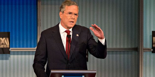 Jeb Bush, former Governor of Florida and 2016 Republican presidential candidate, speaks during a presidential candidate debate in Milwaukee, Wisconsin, U.S., on Tuesday, Nov. 10, 2015. The fourth Republican debate, hosted by Fox Business Network and the Wall Street Journal, focuses on the economy with eight presidential candidates included in the main event and four in the undercard version. Photographer: Daniel Acker/Bloomberg via Getty Images 