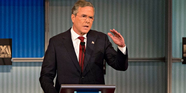 Jeb Bush, former Governor of Florida and 2016 Republican presidential candidate, speaks during a presidential candidate debate in Milwaukee, Wisconsin, U.S., on Tuesday, Nov. 10, 2015. The fourth Republican debate, hosted by Fox Business Network and the Wall Street Journal, focuses on the economy with eight presidential candidates included in the main event and four in the undercard version. Photographer: Daniel Acker/Bloomberg via Getty Images