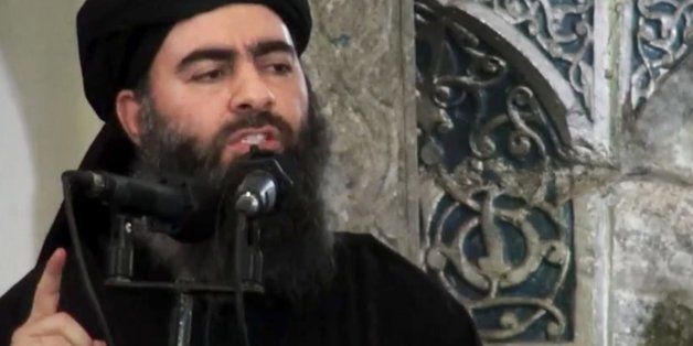 FILE - This file image made from video posted on a militant website Saturday, July 5, 2014, which has been authenticated based on its contents and other AP reporting, purports to show the leader of the Islamic State group, Abu Bakr al-Baghdadi, delivering a sermon at a mosque in Iraq during his first public appearance. An online image released Wednesday purported to show the Islamic State affiliate in Egypt had beheaded a Croatian hostage. (AP Photo/Militant video, File)