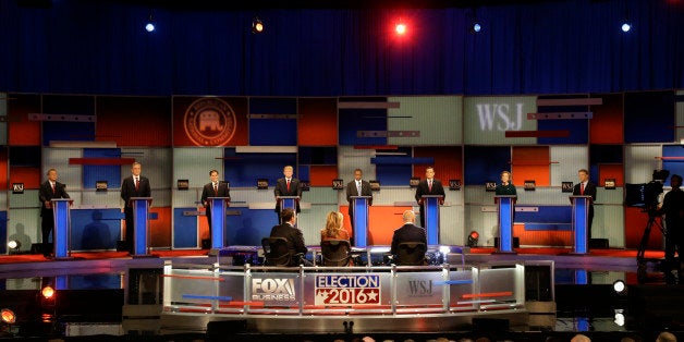 Republican presidential candidates John Kasich, Jeb Bush, Marco Rubio, Donald Trump, Ben Carson, Ted Cruz, Carly Fiorina and Rand Paul appear during the Republican presidential debate at the Milwaukee Theatre, Tuesday, Nov. 10, 2015, in Milwaukee. (AP Photo/Jeffrey Phelps)