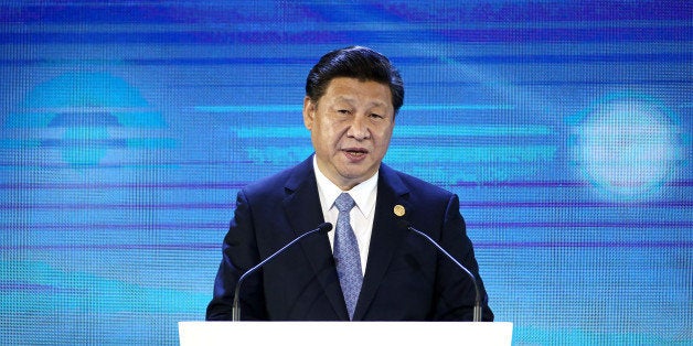 Xi Jinping, China's president, speaks at the Asia-Pacific Economic Cooperation (APEC) CEO Summit in Manila, the Philippines, on Wednesday, Nov. 18, 2015. Xi acknowledged downside risks to growth while assuring fellow leaders that Asia's biggest economy is resilient and will remain on the path of reform. Photographer: SeongJoon Cho/Bloomberg via Getty Images