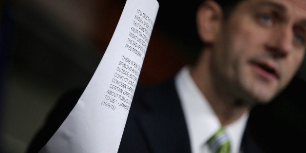 WASHINGTON, DC - NOVEMBER 19: Speaker of the House Paul Ryan (R-WI) reads quotes testimony from Homeland Security Secretary Jeh Johnson and FBI Director James Comey during his weekly news conference at the U.S. Captiol Visitors Center November 19, 2015 in Washington, DC. Ryan said the legislation passed by the House Thursday -- which bars Syrian and Iraqi refugees from entering the U.S. unless they pass strict background checks -- is very urgent and that he is not playing politics with the safety of the United States. (Photo by Chip Somodevilla/Getty Images)