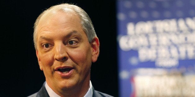 Louisiana Democratic gubernatorial candidate John Bel Edwards speaks to reporters after his debate against challenger Sen. David Vitter, R-La., in Baton Rouge, La., Monday, Nov. 16, 2015. (AP Photo/Gerald Herbert)