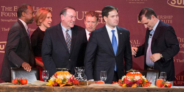 DES MOINES, IA - NOVEMBER 20: Republican presidential candidates (LtoR) Ben Carson, Carly Fiorina, Mike Huckabee, Sen. Rand Paul (R_KY), Sen. Marco Rubio (R-FL) and Ted Cruz (R-TX) chat following the Presidential Family Forum on November 20, 2015 in Des Moines, Iowa. Attendance at the event was lower than organizers had hoped as an early-winter snowstorm moved through the area dumping several inches of snow on the city. (Photo by Scott Olson/Getty Images)