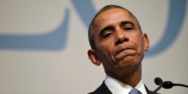 President Barack Obama pauses during a news conference following the G-20 Summit in Antalya, Turkey, Monday, Nov. 16, 2015. (AP Photo/Susan Walsh)