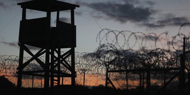 GUANTANAMO BAY, CUBA - JUNE 27: (EDITORS NOTE: Image has been reviewed by the U.S. Military prior to transmission.) A watch tower is seen in the currently closed Camp X-Ray which was the first detention facility to hold 'enemy combatants' at the U.S. Naval Station on June 27, 2013 in Guantanamo Bay, Cuba.The U.S. Naval Station at Guantanamo Bay, houses the American detention center for 'enemy combatants'. President Barack Obama has recently spoken again about closing the prison which has been used to hold prisoners from the invasion of Afghanistan and the war on terror since early 2002. (Photo by Joe Raedle/Getty Images)