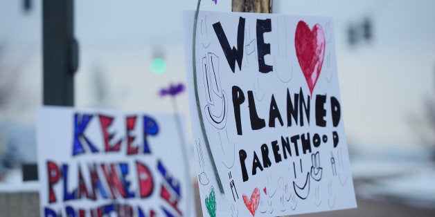 COLORADO SPRINGS, CO - NOVEMBER 29: Signs in support of Planned Parenthood at Fillmore Street and Centennial Boulevard on Nov