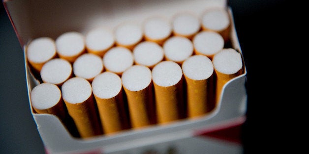 A pack of Philip Morris International Inc. Marlboro cigarettes is displayed for a photograph in Tiskilwa, Illinois, U.S., on