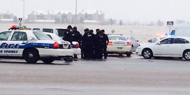 Authorities respond after reports of a shooting near a Planned Parenthood clinic Friday, Nov. 27, 2015, in Colorado Springs, Colo. Multiple officers were injured but it was not known if anyone else was wounded in the attack, authorities said. (Kody Fisher/FOX21 News via AP) MANDATORY CREDIT; COLORADO SPRINGS OUT