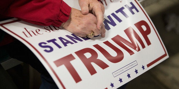 DAVENPORT, IA - DECEMBER 05: Guests wait for Republican presidential candidate Donald Trump to speak at a campaign event at Mississippi Valley Fairgrounds on December 5, 2015 in Davenport, Iowa. Trump continues to lead the most polls in the race for the Republican nomination for president. (Photo by Scott Olson/Getty Images)