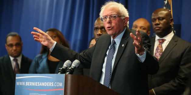 BALTIMORE, MD - DECEMBER 08: Democratic presidential candidate Sen. Bernie Sanders, (I-VT) speaks while flanked by African-American religious and civic leaders after a meeting at the Freddie Gray Youth Empowerment Center, December 8, 2015 in Baltimore, Maryland. Earlier in the day Sanders toured the Sandtown-Winchester neighborhood where Freddie Gray lived and was arrested. (Photo by Mark Wilson/Getty Images)