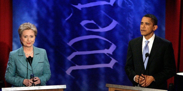 PHILADELPHIA - APRIL 16: Democratic Presidential candidates Sen. Hillary Clinton (D-NY) and Sen. Barack Obama (D-IL) stand at their podiums at the start of their debate at the National Constitution Center on April 16, 2008 in Philadelphia, Pennsylvania. (Photo by Jae C. Hong-Pool/Getty Images)