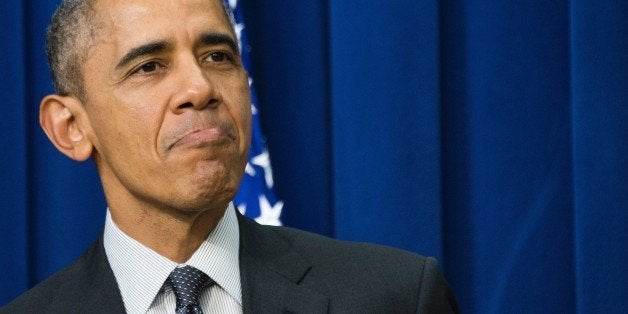 US President Barack Obama speaks before signing S.1177, the 'Every Student Succeeds Act', a bipartisan rewrite of No Child Le