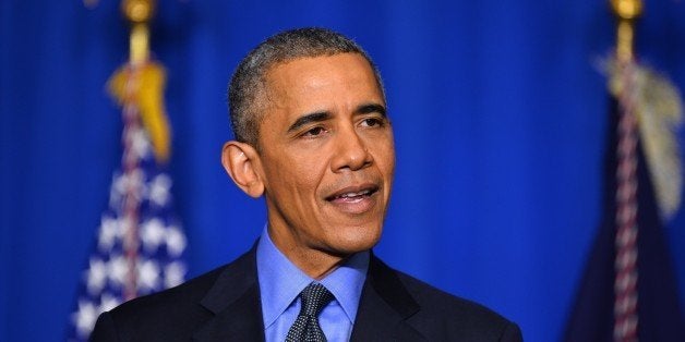 PARIS, FRANCE - DECEMBER 01 : U.S. President Barack Obama speaks during a news conference at the Organization for Economic Cooperation and Development Centre (OECD) in Paris on December 1, 2015. (Photo by Mustafa Yalcin/Anadolu Agency/Getty Images)