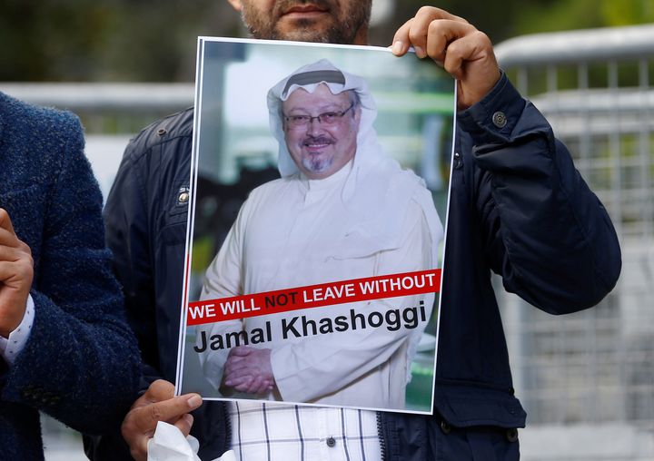 A demonstrator holds picture of Saudi journalist Jamal Khashoggi during a protest in front of Saudi Arabia's consulate in Istanbul, Turkey, October 5, 2018. 