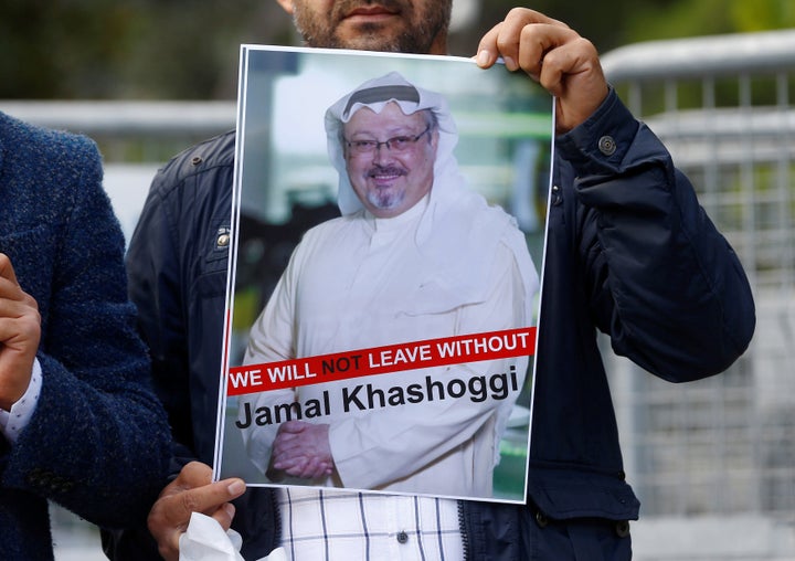 A demonstrator holds picture of Saudi journalist Jamal Khashoggi during a protest in front of Saudi Arabia's consulate in Istanbul, Turkey, October 5, 2018.