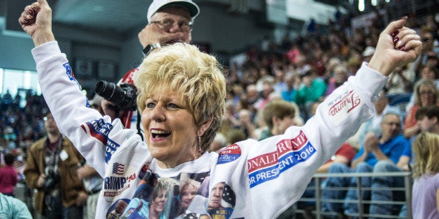 AIKEN, SC - DECEMBER 12, 2015: A woman cheers for Donald Trump before a town hall meeting Saturday, December 12, 2015 in Aiken, South Carolina. The South Carolina Republican primary is scheduled for February 20, 2016. (Photo by Sean Rayford/Getty Images)