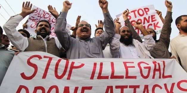 Pakistani protesters from the United Citizen Action (UCA) group shout anti-US slogans during a demonstration against US drone strikes in Pakistan's tribal region in Multan on October 8, 2014. At least five militants were killed on October 7 when a US drone fired missiles on a compund in Pakistan's restive tribal region, taking the death toll to 18 after three strikes in three days, officials said. AFP PHOTO/ SS MIRZA (Photo credit should read SS MIRZA/AFP/Getty Images)
