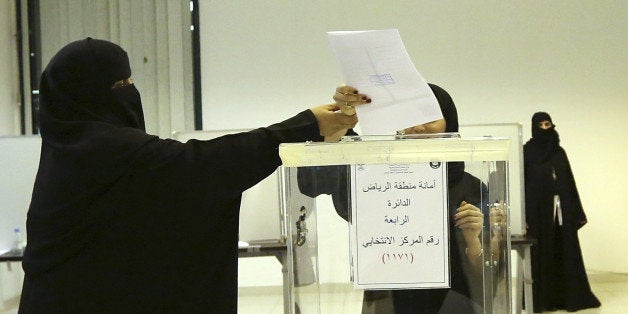 Saudi women vote at a polling center during municipal elections in Riyadh, Saudi Arabia, Saturday, Dec. 12, 2015. Saudi women