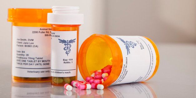 USA, Illinois, Metamora, Pills spilling from pill bottle
