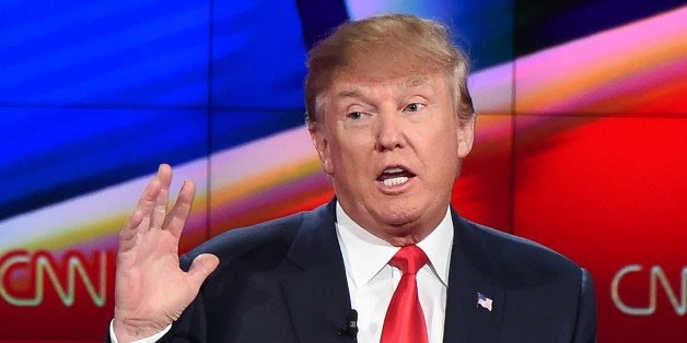 Republican presidential Donald Trump speaks at the Republican Presidential Debate, hosted by CNN, at The Venetian Las Vegas o