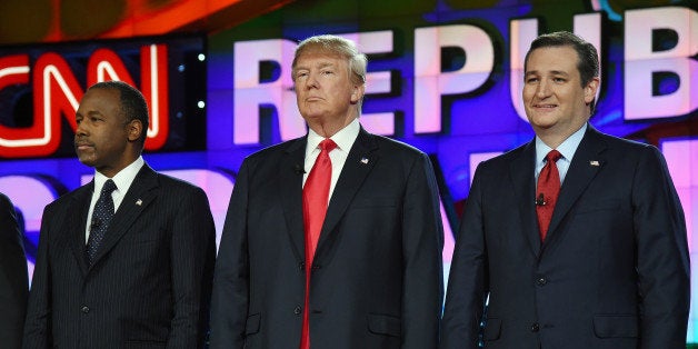 LAS VEGAS, NV - DECEMBER 15: Republican presidential candidates (L-R) Ben Carson, Donald Trump and Sen. Ted Cruz stand on stage during the CNN presidential debate at The Venetian Las Vegas on December 15, 2015 in Las Vegas, Nevada. Thirteen Republican presidential candidates are participating in the fifth set of Republican presidential debates. (Photo by Ethan Miller/Getty Images)