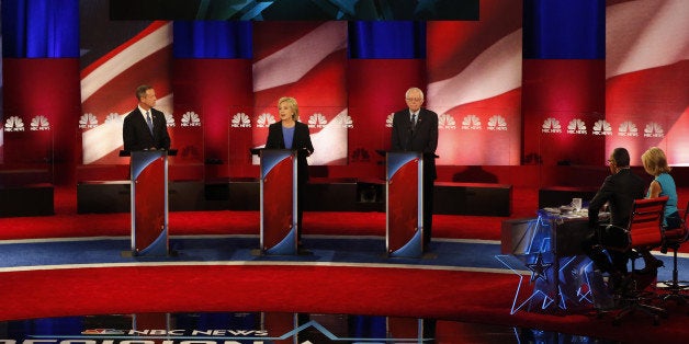 2016 Democratic presidential candidates Martin O'Malley, former governor of Maryland, from left, Hillary Clinton, former Secretary of State, and Senator Bernie Sanders, an independent from Vermont, participate in the Democratic presidential candidate debate in Charleston, South Carolina, U.S., on Sunday, Jan. 17, 2016. Hours before Sunday's Democratic debate, the two top Democratic contenders held a warm-up bout of sorts in multiple separate appearances on political talk shows, at a time when the polling gap between the pair has narrowed in early-voting states. Photographer: Patrick T. Fallon/Bloomberg via Getty Images 