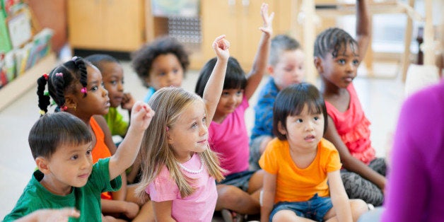 A diverse group of preschoolers in a classroom