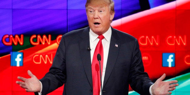 Donald Trump makes a point during the CNN Republican presidential debate at the Venetian Hotel & Casino on Tuesday, Dec.