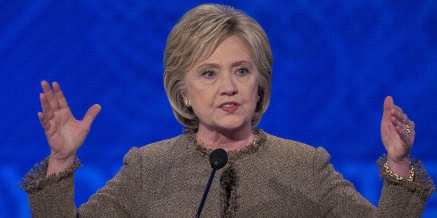 Hillary Clinton, former Secretary of State and 2016 Democratic presidential candidate, speaks during the Democratic presidential candidate debate at Saint Anselm College in Manchester, New Hampshire, U.S., on Saturday, Dec. 19, 2015. A Democratic presidential campaign that has looked tame compared to the one being waged by Republicans appears to be taking a sharp turn for the nasty as the three candidates participate in their third debate. Photographer: Andrew Harrer/Bloomberg via Getty Images 